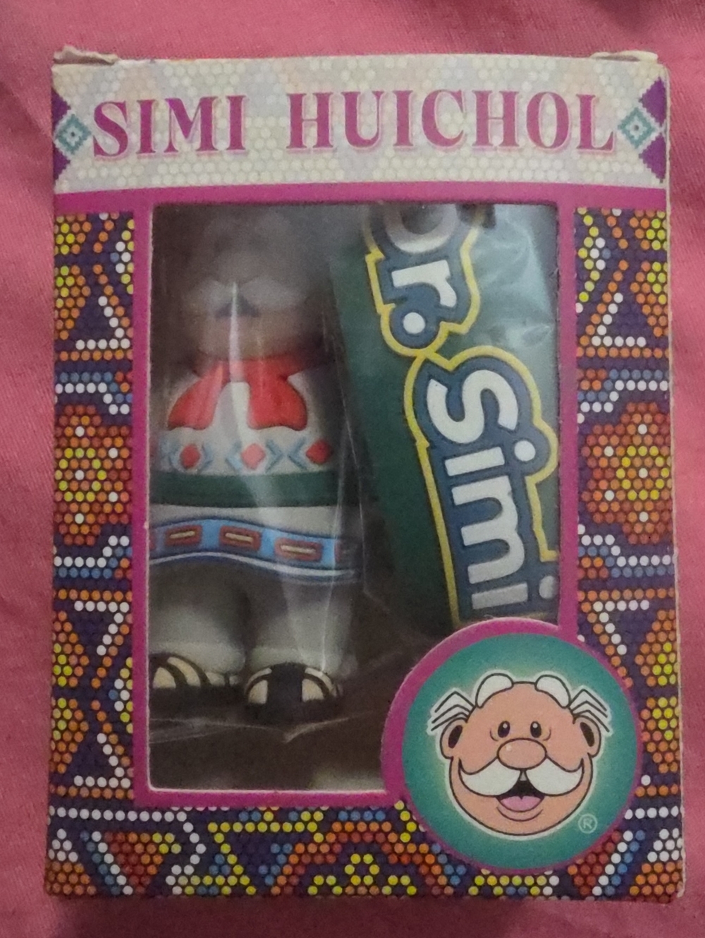 New in box .dr simi huichol keychain .